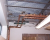 MidTown Palatine plumbing on ceiling.jpg